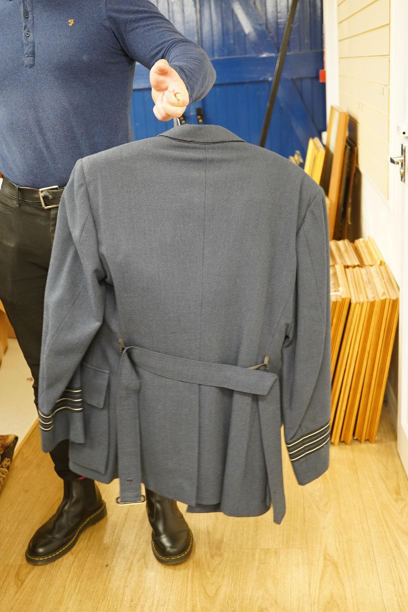 Two post-WWII RAF uniforms, one with applied medal ribbons, an RAF cap, and related buttons, together with a bowler hat and two Arab daggers. Condition - good